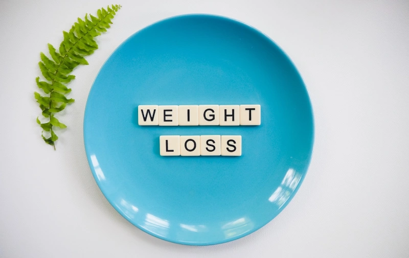 weight loss word on a plate