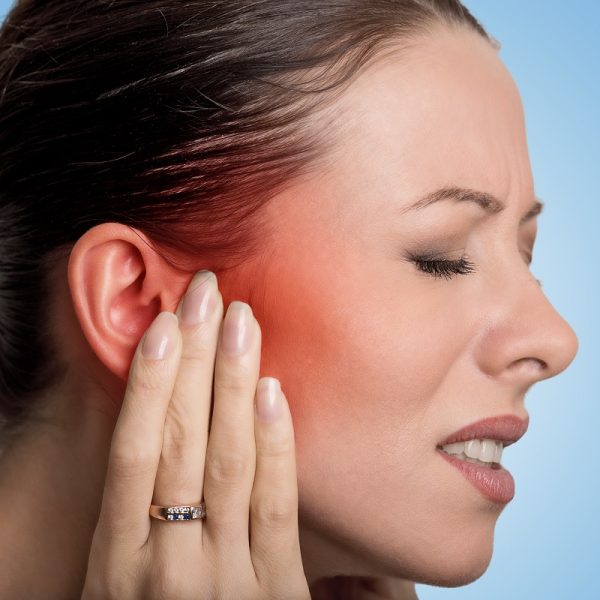 woman having ear pain
